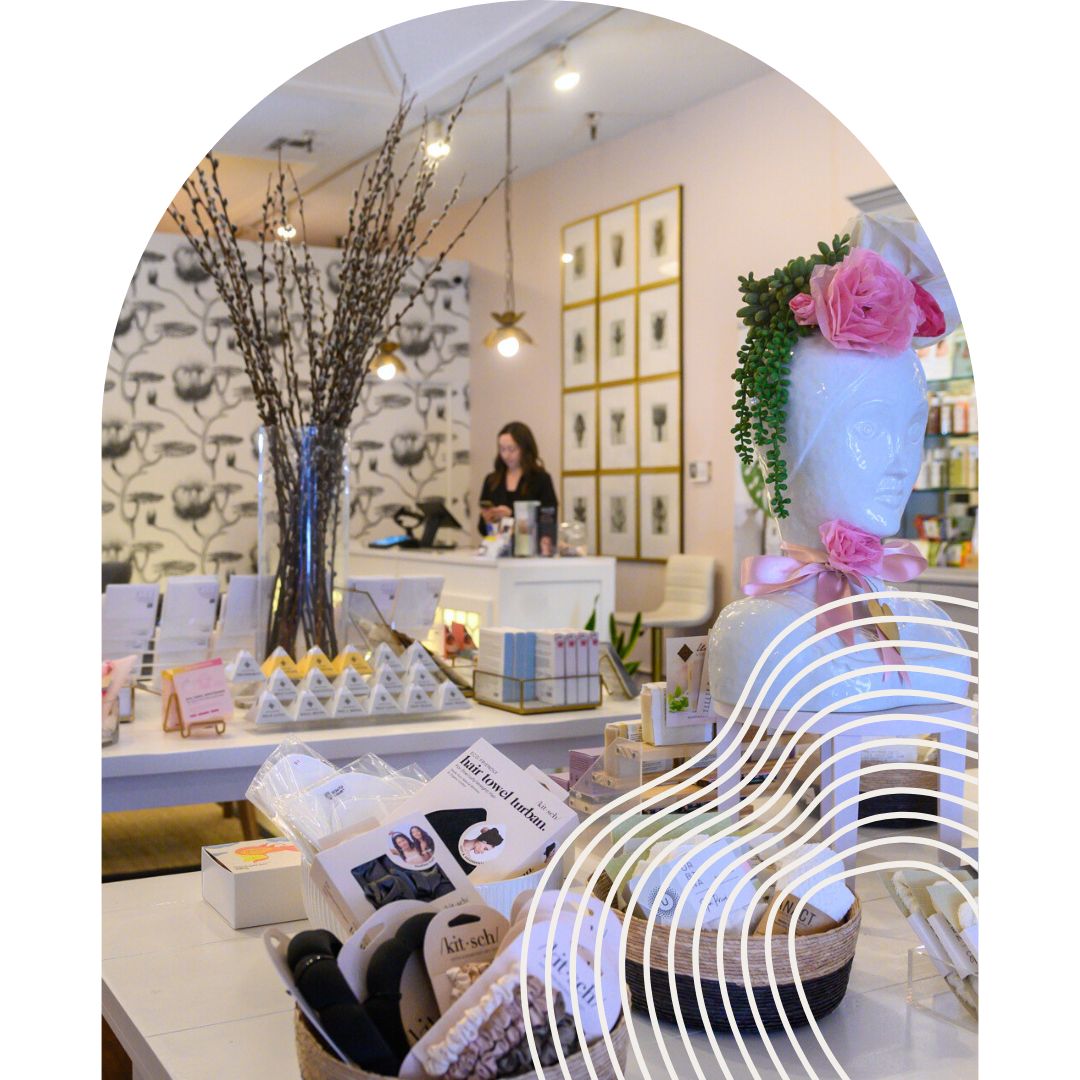 POSH Organics owner Alicia behind the counter in the shop